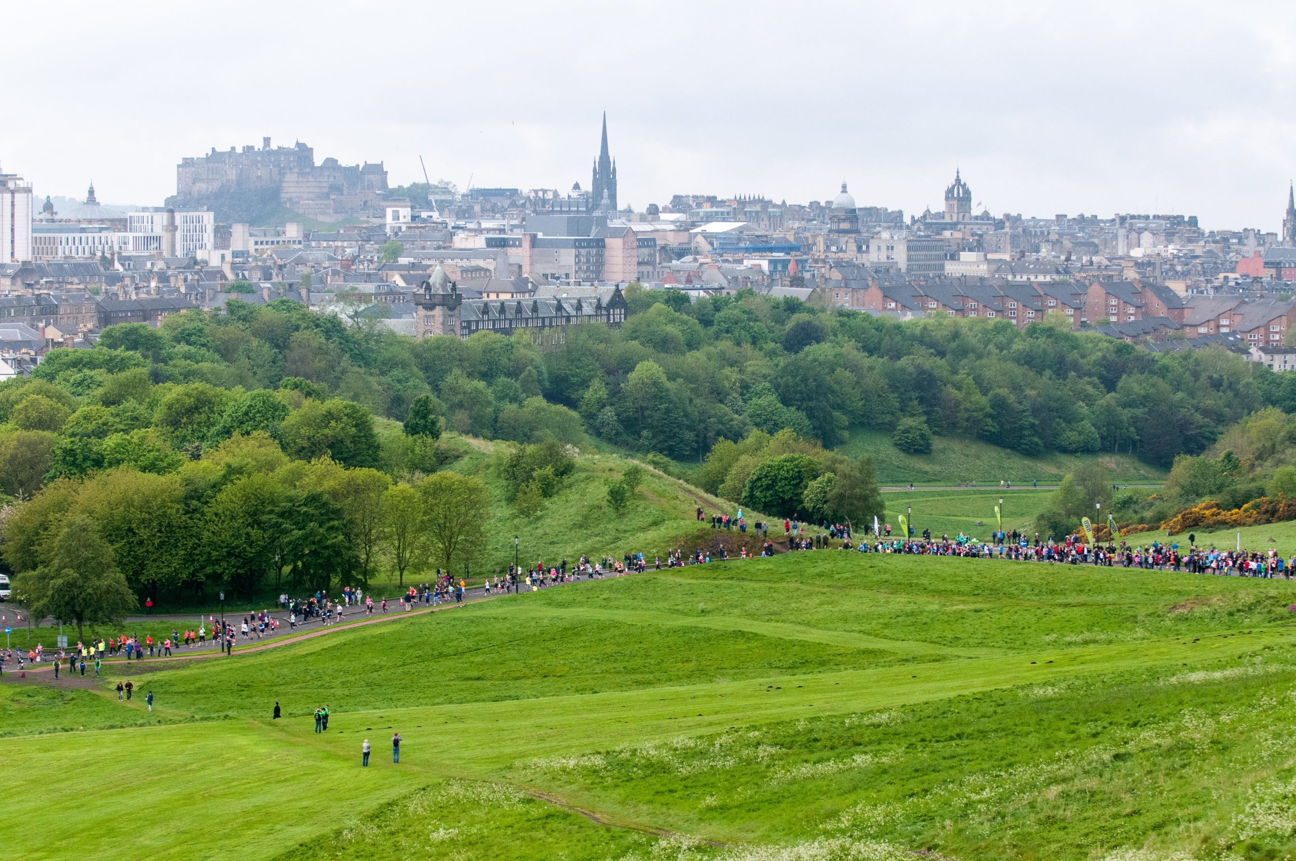 Group of people running the Edinburgh Marathon.