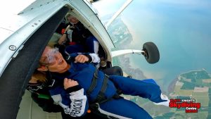 Michelle getting ready to jump out of the plane for her skydive.